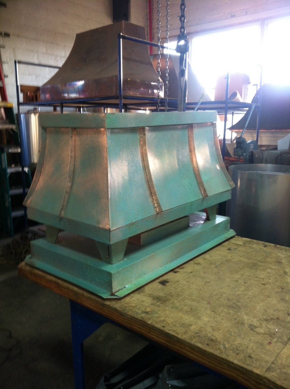 copper patina green standing seam sweep shroud